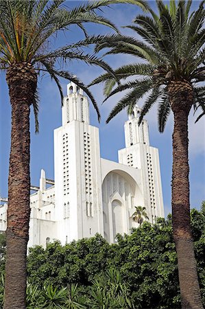 The Cathedral du Sacre Coeur in Casablanca. Designed in 1930 by Paul Tornon,the striking exterior is dominated by three rows of butresses with gargoyles. Stock Photo - Rights-Managed, Code: 862-03364653