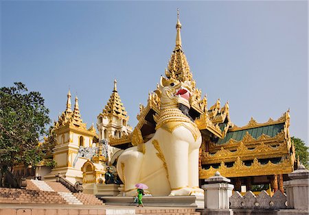 Myanmar,Burma,Yangon. Chinthe (half lion,half dragon guardians) at the entrance to Shwedagan Golden Temple,the largest and most scared of all Buddhist sites. Stock Photo - Rights-Managed, Code: 862-03365081