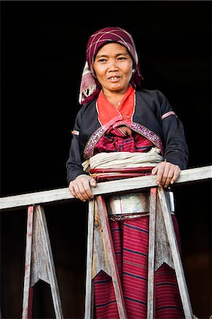 Myanmar. Burma. Wanpauk village. A Palaung woman of the Tibetan-Myanmar group of tribes. Women commonly display their wealth by wearing broad silver belts. Stock Photo - Rights-Managed, Code: 862-03365206
