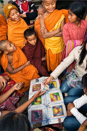 Myanmar. Burma. Wanpauk village. Street gambling at Wanpauk village. Stock Photo - Rights-Managed, Code: 862-03365203