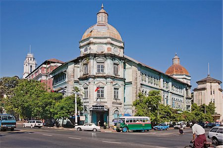 facade of colonial city - Myanmar,Burma,Yangon. The faded splendour of grand buildings in Yangon denotes the country’s colonial past under British rule. Stock Photo - Rights-Managed, Code: 862-03365264