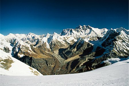 Nepal,Solo-Khumbu,Mera Peak. Sagarmatha National Park seen from near the summit of Mera Peak (6476m). The view from Mera Peak is one of the finest in the Himalayas,providing a panorama of some of the highest and most spectacular peaks in the world. The summit of Everest is visable on the centre-right. Foto de stock - Con derechos protegidos, Código: 862-03365477