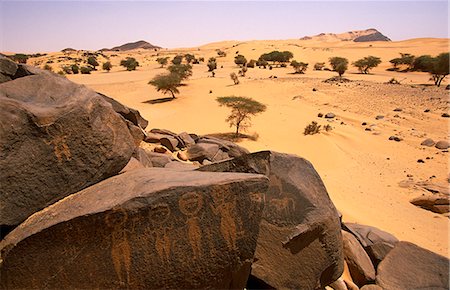 sketch art - Niger,Tenere Desert. Rock Art thought to be 30,000 years old found near the Oasis of Tezizet. Stock Photo - Rights-Managed, Code: 862-03365489