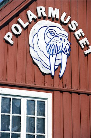 Norway,Troms,Tromso. The Polar Museum or Polarmuseet in the historic area of the old port area of Tromso which displays the Arctic Hunting that took place from Tromso,as well as the expeditions to the Arctic. Stock Photo - Rights-Managed, Code: 862-03365568