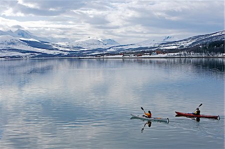 simsearch:862-03365677,k - Norway,Tromso. Winter sea kayaking- a pair of kayakers paddle down a fjord near Tromso Stock Photo - Rights-Managed, Code: 862-03365608