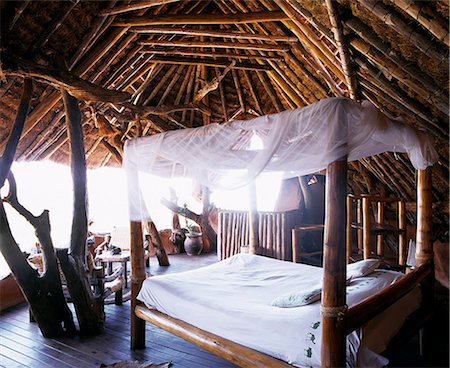 four poster bed - Bedroom at Il Ngwesi Camp. Foto de stock - Con derechos protegidos, Código: 862-03366014