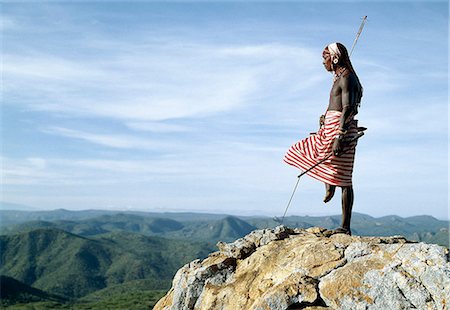 samburu - Un guerrier Samburu monte la sentinelle sur une vaste étendue de pays gommage bush préservé, semi-aride. Les pâturages pauvres ici sont une ressource importante pour le peuple pastoral de Samburu. Photographie de stock - Rights-Managed, Code: 862-03366018