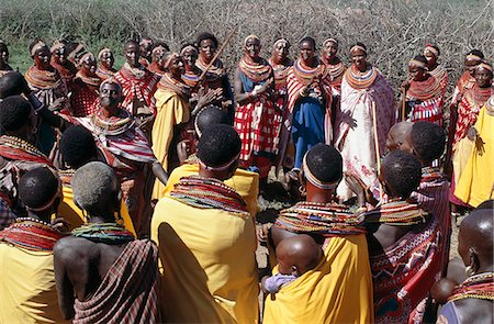 During Samburu wedding celebrations,married women congregate apart from the warriors and young girls to sing in praise of the couple and to dance. Stock Photo - Rights-Managed, Code: 862-03366055