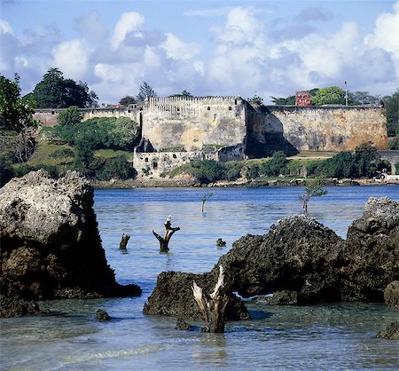 Built by the Portuguese between 1593 and 1598,Fort Jesus overlooks the entrance to the Old Harbour of Mombasa. The fort is now a museum. Stock Photo - Rights-Managed, Code: 862-03366191