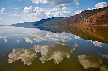 Kenya,Kabarnet. Lake Bogoria,an alkaline lake in Africa’s Great Rift Valley,which is renowned for its dramatic scenery,volcanic steam jets and large flocks of lesser flamingo. Stock Photo - Rights-Managed, Code: 862-03366799