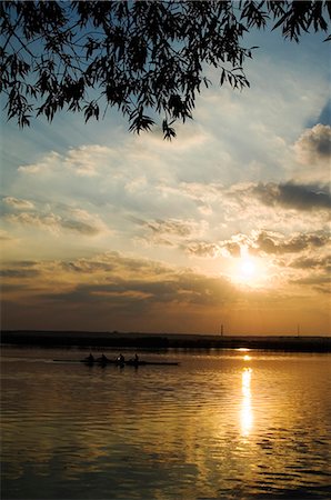 Rowers on River at Sunset Stock Photo - Rights-Managed, Code: 862-03367103