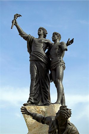 Statue in Martyrs' Square,Beirut. The square was named in 1916 in memory of Lebanese and Syrian nationalists executed by the Ottomans. The statue was errected in the 1950s,and is now peppered with bullet holes from the 16 year civil war which ended in 1990. Stock Photo - Rights-Managed, Code: 862-03367112