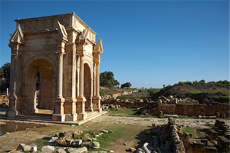 The magnificent arch of Septimus Severus (AD 203) which dominates the entrance to the site of Leptis Magna,Libya. Stock Photo - Rights-Managed, Code: 862-03367160