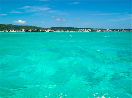 seawater - The beautiful,crystal-clear Mer d'Emeraude (Emerald Sea) lies just off the Malagasy coast between Andavakonko and Suarez Island,northeast of Antsiranana (Diego Suarez). Stock Photo - Rights-Managed, Code: 862-03367255