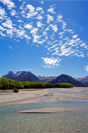 dart river - New Zealand,South Island. Mountain scenery along the Dart River in Mt Aspiring National Park. Stock Photo - Rights-Managed, Code: 862-03360101