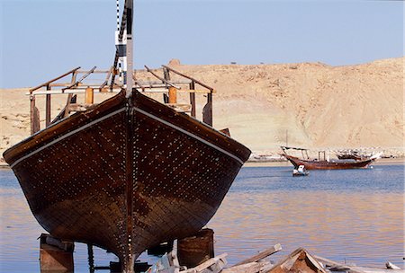 dhow - Dhow under construction at the boat building yard in Sur. Stock Photo - Rights-Managed, Code: 862-03360197