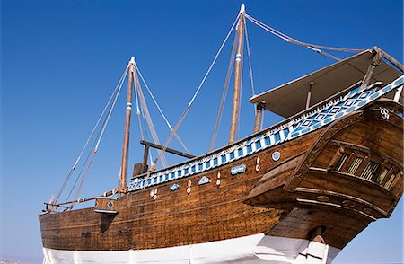 fishing vessel - The restored dhow Fatah Al Khair is preserved at an outdoor museum in Sur. One of the last ocean-going passenger dhows,it is a ghanjah and is estimated to be around 300 tonnes and over 20 metres long Stock Photo - Rights-Managed, Code: 862-03360200