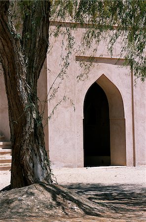 simsearch:862-03437387,k - An arched door in the castle at Jaalan Bani bu Hasan Stock Photo - Rights-Managed, Code: 862-03360214