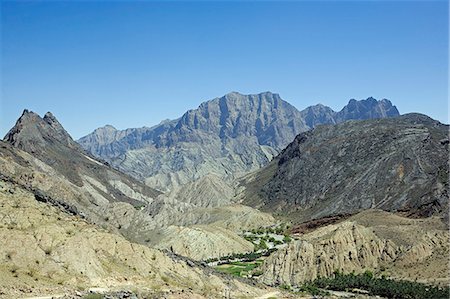 sedimentary - Oman,Western Hajar Mountains. West of the coastal areas lies the tableland of central Oman and the western Al Hajar Mountains (Al Hajar al Gharbi Mountains) dominated by Jebel Akhdhar - the Green Mountain at 2980m. Foto de stock - Con derechos protegidos, Código: 862-03360311