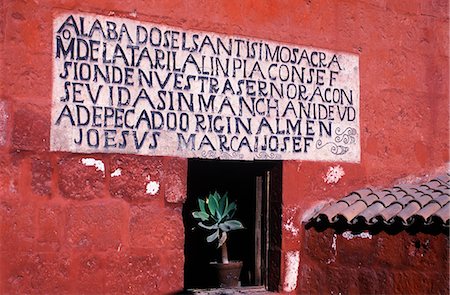 A carved inscription frames a window. Stock Photo - Rights-Managed, Code: 862-03360423