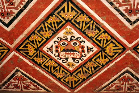 simsearch:862-03360473,k - Polychrome frieze representing the face of the Moche god Aipaec decorates a wall in the Temple of the Moon near Trujillo in northern Peru Foto de stock - Con derechos protegidos, Código: 862-03360625
