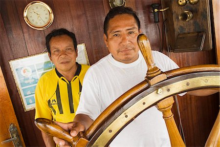 simsearch:862-03437308,k - Peru,Amazon,Amazon River. Crew steering the Ayapua Riverboat up the Amazon River. . Foto de stock - Con derechos protegidos, Código: 862-03360644