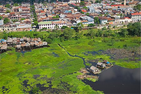 Peru,Amazon,Amazon River,Iquitos. Aerial view of the port,harbour and settlements of Iquitos,the principle city of the Upper Amazon Basin. Foto de stock - Direito Controlado, Número: 862-03360665