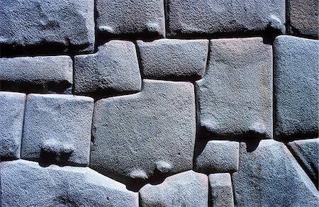 simsearch:862-03360473,k - Hatun Rumiyoc (great stone) street in Cuzco - one of the surviving walls of the Inca Roca's Palace. Foto de stock - Con derechos protegidos, Código: 862-03360703
