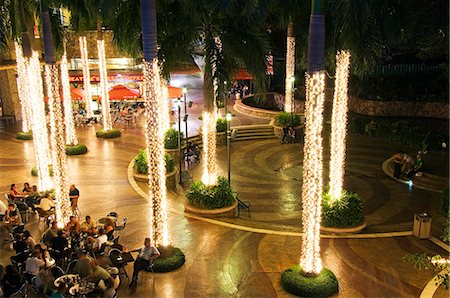 Philippines,Luzon,Manila. Makati district greenbelt - entertainment area with illuminated palm trees and outdoor dining. Stock Photo - Rights-Managed, Code: 862-03360752