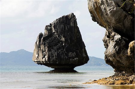 strange rocks - Philippines,Palawan Province,El Nido Town,Bacuit Bay. Unusual limestone rock formations near Corong Corong Town. Stock Photo - Rights-Managed, Code: 862-03360827