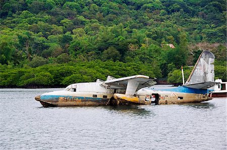 Philippines, ville de la Province de Palawan, île de Busuanga, Coron. Épave d'avion eau abandonnés. Photographie de stock - Rights-Managed, Code: 862-03360828
