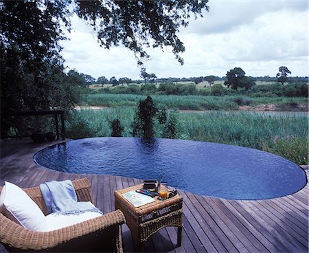 secluded - Each suite at Singita has a private deck and plunge pool looking our to the bush beyond Stock Photo - Rights-Managed, Code: 862-03361158