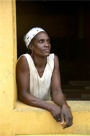 simsearch:862-03361282,k - A Sao Tomense woman at the cocoa plant where she works in the small village of Agua Izé in Sao Tomé and Principé. Sao Tomé and Principé is Africa's second smallest country with a population of 193 000. It consists of two mountainous islands in the Gulf of New Guinea,straddling the equator,west of Gabon. Stock Photo - Rights-Managed, Code: 862-03361282
