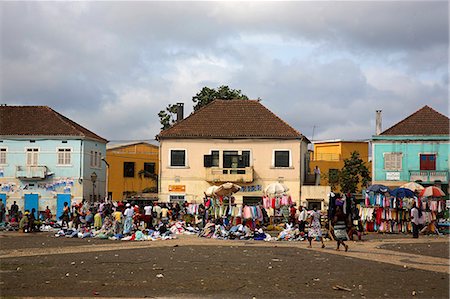 simsearch:862-03361282,k - Clothes market in the city of Sao Tomé. Sao Tomé and Principé is Africa's second smallest country with a population of 193 000. It consists of two mountainous islands in the Gulf of New Guinea,straddling the equator,west of Gabon. Stock Photo - Rights-Managed, Code: 862-03361311