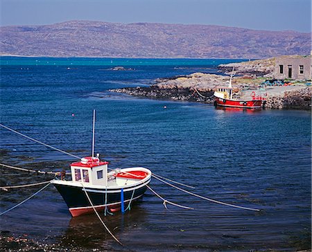 scotland whisky - Fishing boat overlooking the Sound of Eriskay from South Uist. Stock Photo - Rights-Managed, Code: 862-03361356