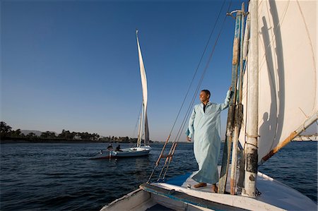 felucca - Feluccas sailing on the Nile at Luxor,Egypt Foto de stock - Con derechos protegidos, Código: 862-03437024