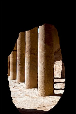 simsearch:862-03288386,k - Jordan,Petra. Looking out from the Urn Tomb part of a complex of so called Royal Tombs set into the rock-face of the Jabal Al-Khubtha. Foto de stock - Con derechos protegidos, Código: 862-03437151