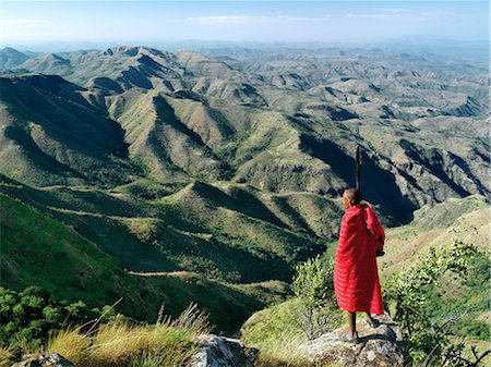 A magnificent view from the eastern scarp of Africa's Great Rift Valley at Losiolo,north of Maralal. From 8,000 feet the land tumbles away 3,000 feet into rugged valleys and a broad plain,the domain of nomadic pastoralists,before rising again 75 miles away. The views at Losiolo are the finest in Kenya of the largest,longest and most conspicuous physical feature of its kind on earth. Stock Photo - Rights-Managed, Code: 862-03437182