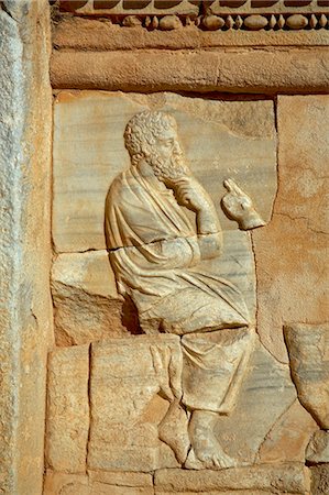 roman - Carving of a philosopher in one of rectangular niches found at the front of the stage in the Theatre at Sabratha,Libya. Stock Photo - Rights-Managed, Code: 862-03437211