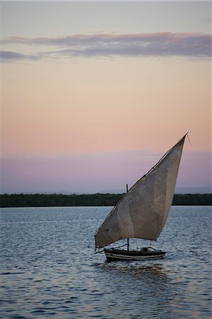 dhow - A dhow sails into Ibo Island,part of the Quirimbas Archipelago,Mozambique Stock Photo - Rights-Managed, Code: 862-03437264