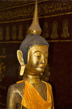 Myanmar,Burma,Kengtung. A ancient wooden statue of Buddha in the Wat In monastery at Kengtung,possibly dating back to the 9th or 10th centuries. Stock Photo - Rights-Managed, Code: 862-03437275