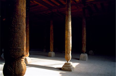 Elaborately carved wooden columns in the main hall of the Jame (Friday) mosque which dates between the 10th to 18th Century Stock Photo - Rights-Managed, Code: 862-03437667