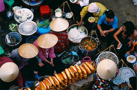 Vendors selling freshly cooked vegetables,soups & noodles in the Central Market Stock Photo - Rights-Managed, Code: 862-03437682