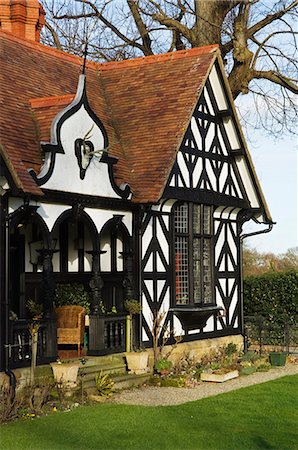 Wales,Wrexham,Chirk. The ornate half-timbered gatekeeper's lodge at the entrance to Chirk Castle. Stock Photo - Rights-Managed, Code: 862-03437755