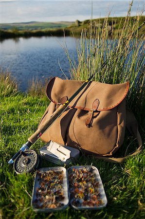 UK,Wales,Conwy. A trout rod and fly fishing equipment beside a hill lake in North Wales Stock Photo - Rights-Managed, Code: 862-03437819