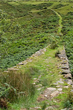 streetcar track - Wales,Conwy,Snowdonia. An old disused tramway runs down from the derelict slate quarries and copper mines alongside the Watkin Path one of the routes up Snowdon. Stock Photo - Rights-Managed, Code: 862-03437836