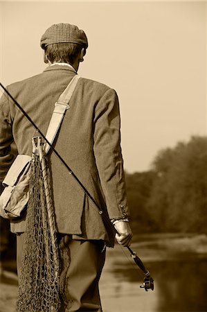 river dee - Wales; Wrexham. A trout fisherman surveys the lie of the River Dee Fotografie stock - Rights-Managed, Codice: 862-03437871