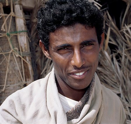 Un jeune homme à Mahferhin, un village de pêcheurs dans le sud-est de l'île de Socotra. Photographie de stock - Rights-Managed, Code: 862-03437925