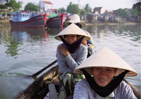 People in rowing boat, Nha Trang, Vietnam Stock Photo - Rights-Managed, Code: 862-03714200