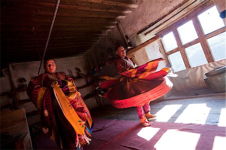 Participants at the tsechu in Wangdue Phodrang getting ready for a performance. Wangdue Phodrang is a town and capital of Wangdue Phodrang District in central Bhutan. Stock Photo - Rights-Managed, Code: 862-03710534